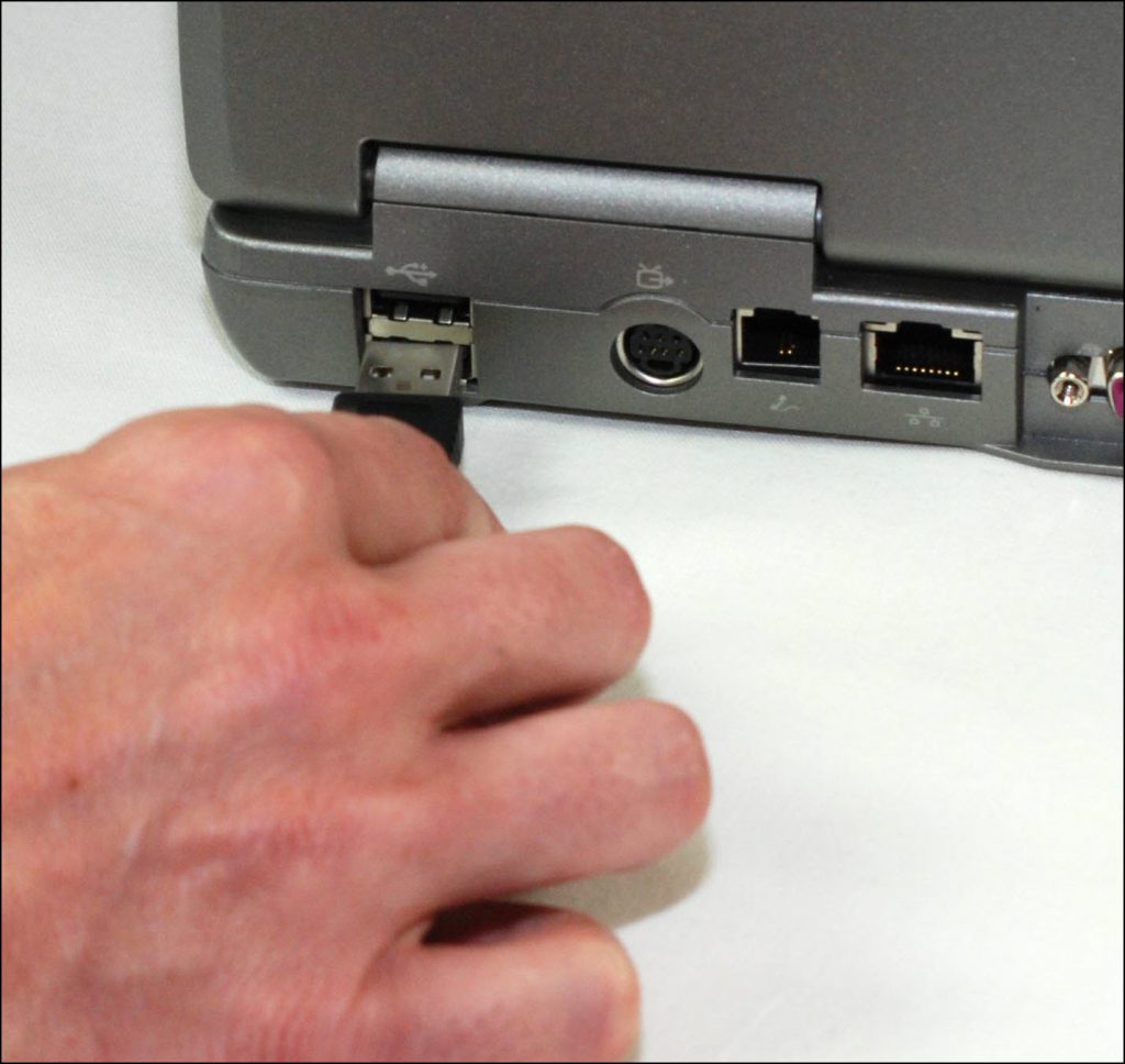 A picture containing indoor, person, camera, white Description automatically generated