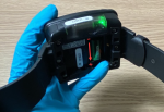 Image of Battery Installed in Bracelet with Green Light On
