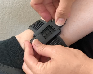 Image of Installing the Tamper Clips on a Bracelet