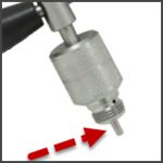 Recycling tool center punch fully extended.